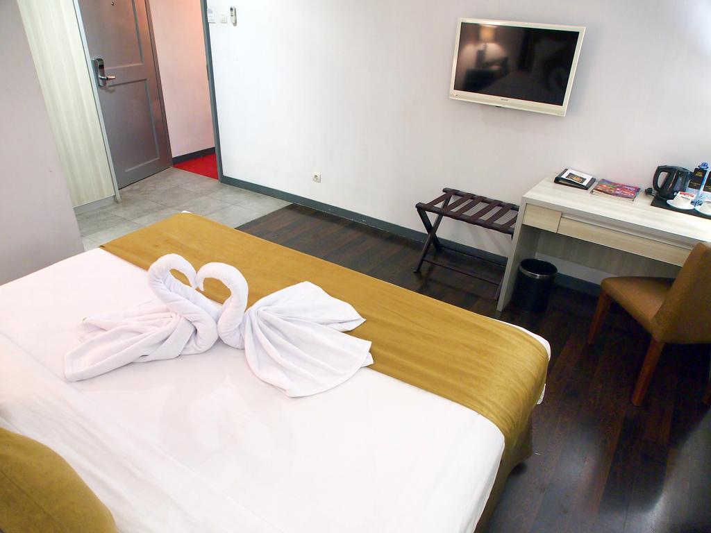 Maven Fatmawati Hotel Jakarta Szoba fotó